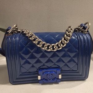 Small Blue Chanel Boy Flap bag in quilted plexiglass patent leather.